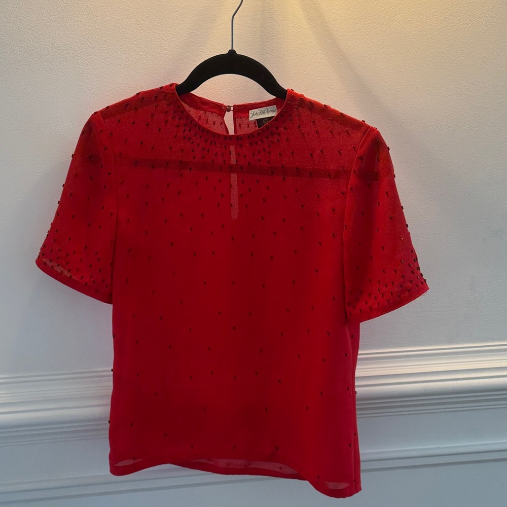 Sheer beaded blouse with accents